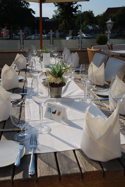 Muensterlaender Hof Hotel คลอปเพนบวร์ก ภายนอก รูปภาพ